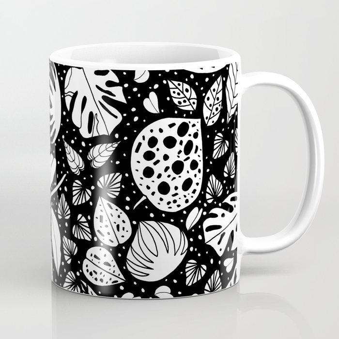 An assortment of black-and-white leaves Coffee Mug