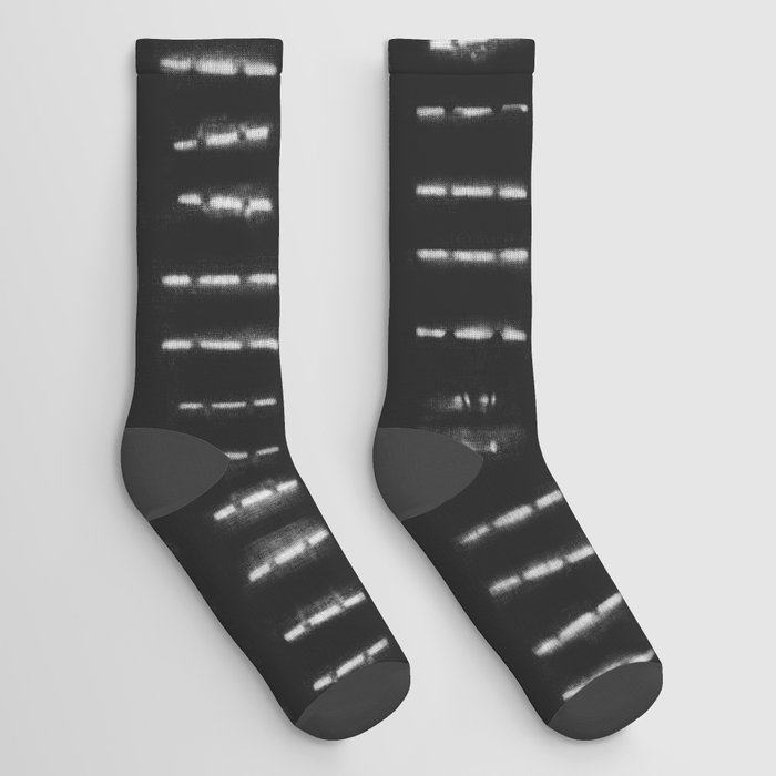 White vertical stripes over black background Socks