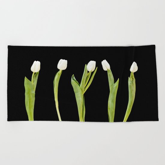 White tulips on a black background Beach Towel