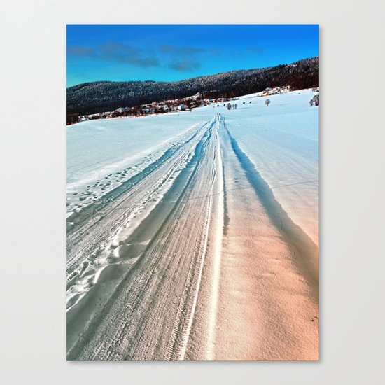 Winter road into the mountains Canvas Print