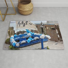 Boat at the seaside Rug