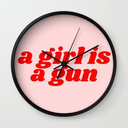 a girl is a gun Wall Clock