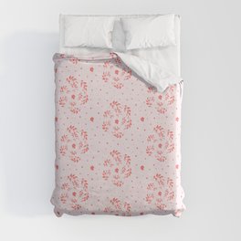 An endless pattern of red twigs arranged in a spiral on a pink background. Duvet Cover