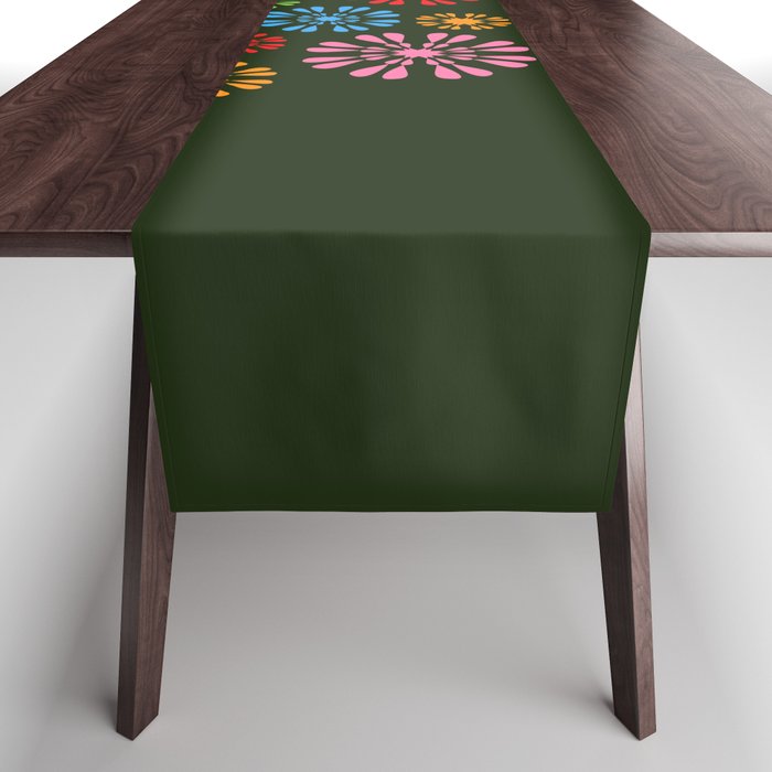 Colorful snowflake flowers on dark background Table Runner