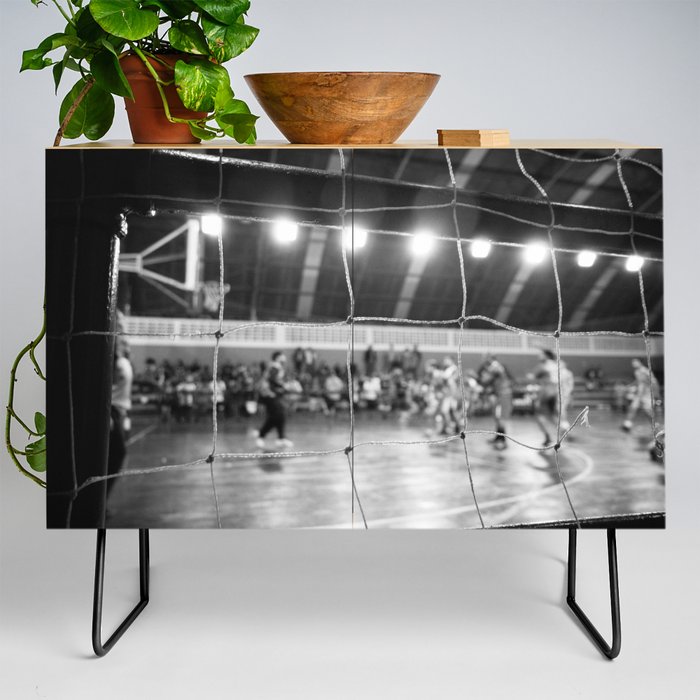 Black and White Photo of a handball game from behind the net Credenza