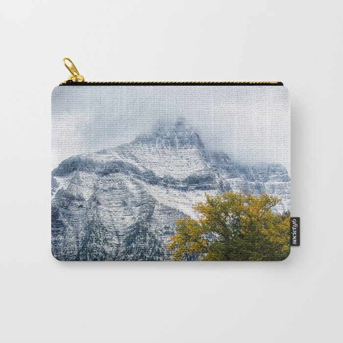 Transitions - Snowy Mountain Peak Overlooking Trees with Fall Color on Autumn Day in Glacier National Park Montana Carry-All Pouch