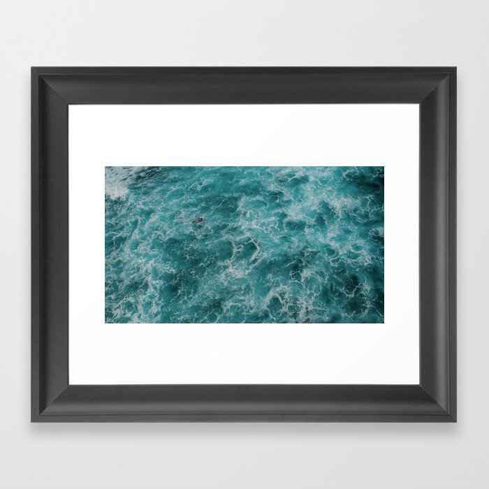 Surfer Paddling Out In The Water Framed Art Print