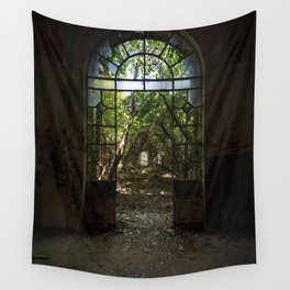 Arched door with broken windows in an old dilapidated Italian building Wall Tapestry