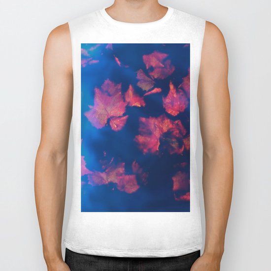 Rusty red falling leaves in dark blue water Biker Tank