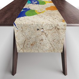 Rainbow color painted world map on dirty old grunge cement wall Table Runner