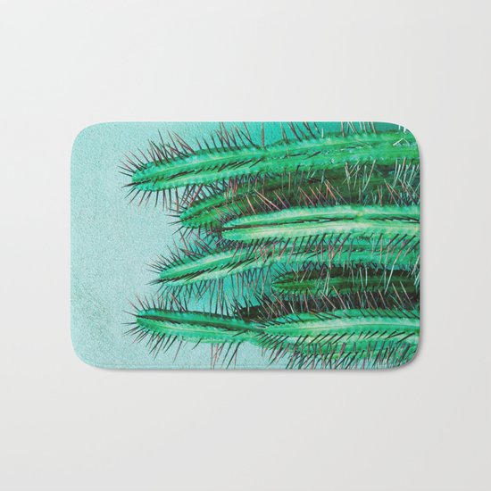 A prickly cactus on concrete Bath Mat