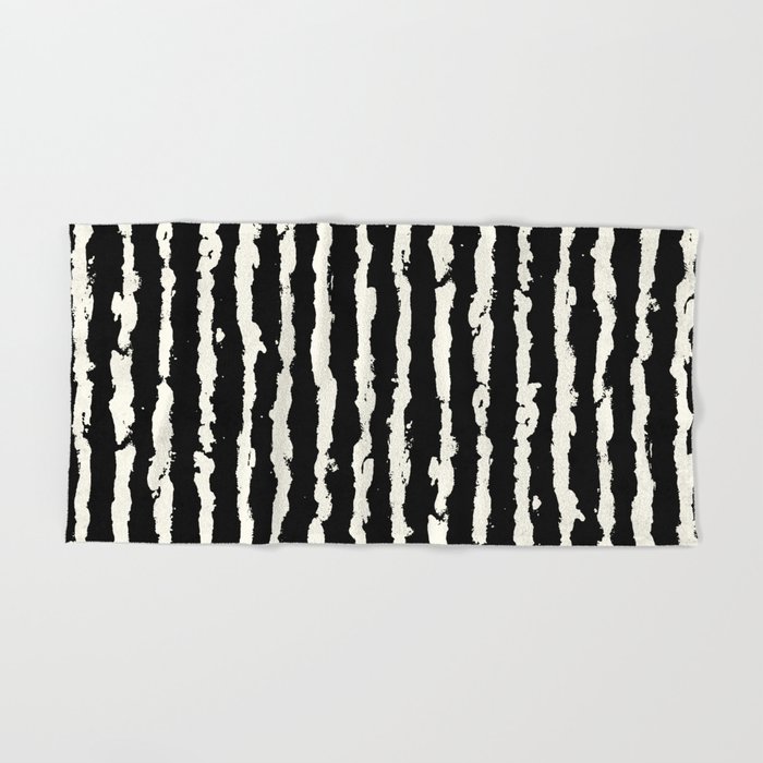 cream and black towels