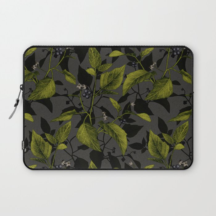 Black Nightshade Plant on Gray Laptop Sleeve