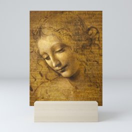 La Scapigliata, Head Of A Young Woman With Tousled Hair, 1508 by Leonardo da Vinci Mini Art Print