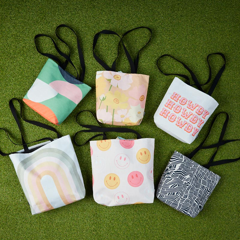 assortment of tote bags