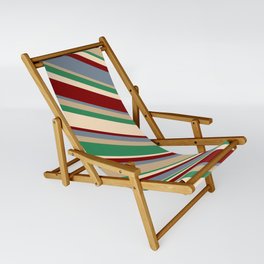 [ Thumbnail: Vibrant Light Slate Gray, Tan, Sea Green, Bisque, and Maroon Colored Lines Pattern Sling Chair ]