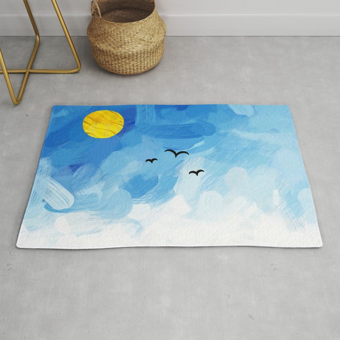a flight of swallows in a beautiful blue sky Rug