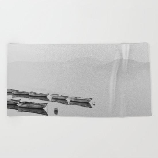 Small boat lake black white Beach Towel