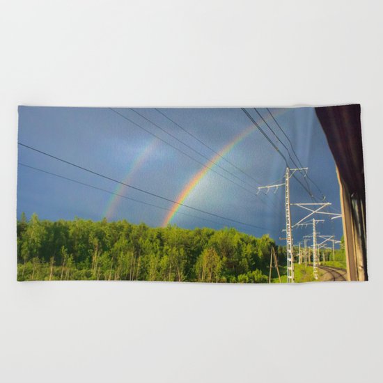 The railway into the dream Beach Towel