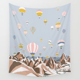 Hot air balloons over snowy mountains Wall Tapestry