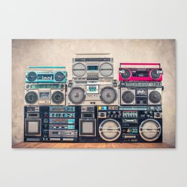 Retro old school design ghetto blaster stereo radio cassette tape recorders boombox tower from circa 1980s front concrete wall background. Vintage style filtered photo Canvas Print