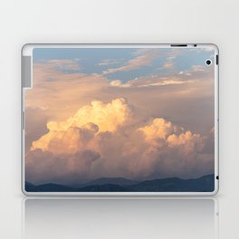 Cloudy orange sunset over the mountains Laptop Skin