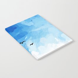 a flight of swallows in a beautiful blue sky Notebook
