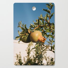 Green pomegranate, red fruit at the market in Ostuni, Italy | Colorful travel food photography art print Cutting Board