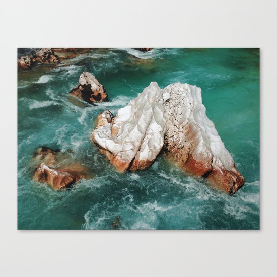 Sharp rock in river Canvas Print