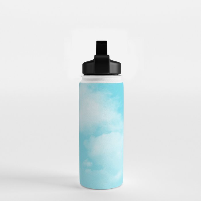 Cute puffy small white clouds on a sunny aqua blue sky Water Bottle by  ARTbyJWP