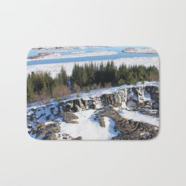 Ice frozen on Rocky Mountains with trees Bath Mat