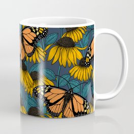 Monarch butterfly on yellow coneflowers  Coffee Mug