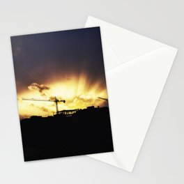 The sun set on construction crane Stationery Card