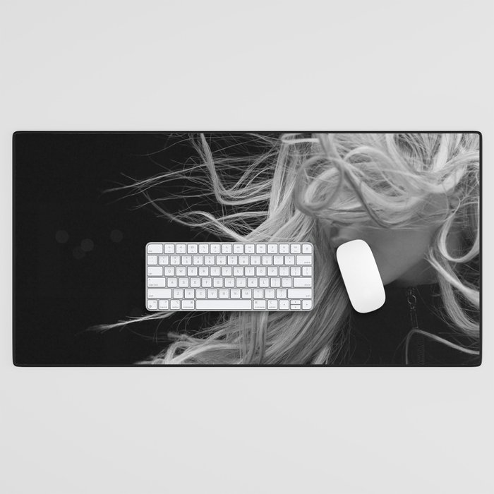Blond with the wind in her hair black and white portrait photograph / photography / photographs Desk Mat