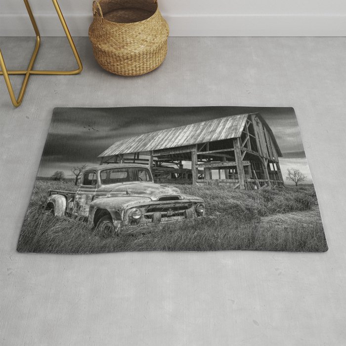 Rusted Pickup Truck in Black and White in a Rural Landscape Rug