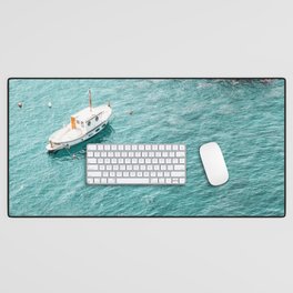 White boat floating in turquoise pastel color sea | Cinque Terre Italy Desk Mat