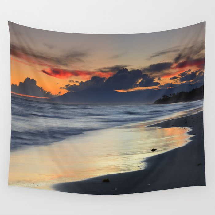 Magic red clouds. Sea dreams Wall Tapestry by Guido Montañés | Society6
