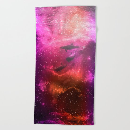Floating Dolphins in mystic light Beach Towel