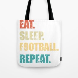 Eat sleep football repeat. Tote Bag