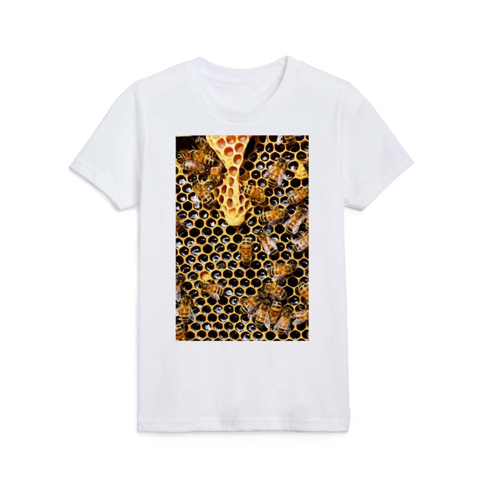 swarm of bees on honeycomb Kids T Shirt
