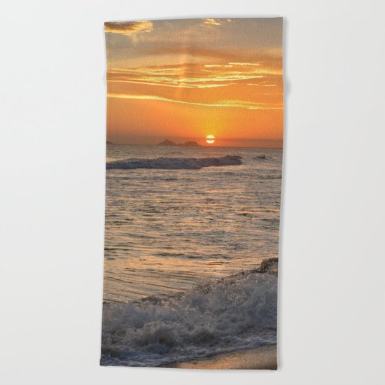 Sunset with crashing waves Beach Towel