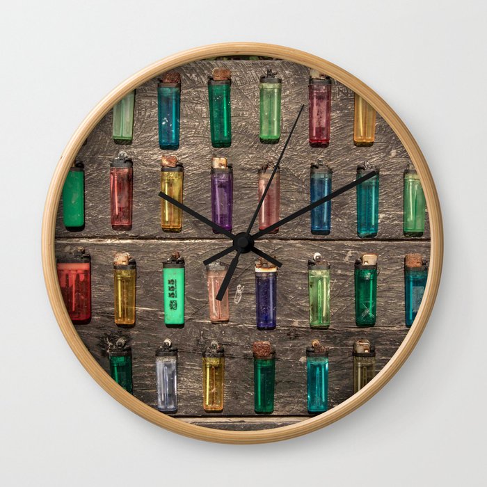Grid of found Beach Lighters from Cambodia Wall Clock