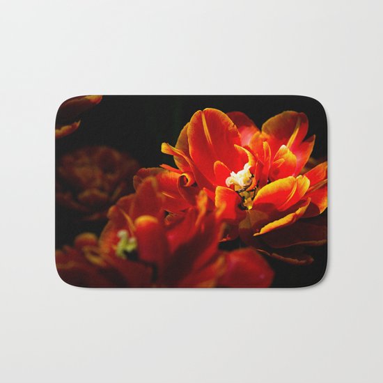 Red tulips dark background Bath Mat