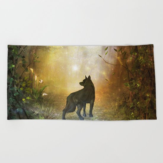 The lonely wolf Beach Towel