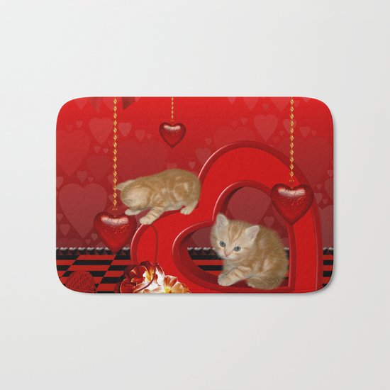 Cute, playing kitten Bath Mat