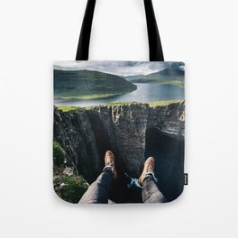 leaning on the faroe landscape Tote Bag