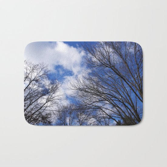 Reaching for the clouds Bath Mat