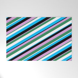 [ Thumbnail: Eyecatching Plum, Sea Green, White, Deep Sky Blue, and Black Colored Pattern of Stripes Welcome Mat ]