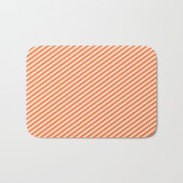 [ Thumbnail: Bisque and Coral Colored Pattern of Stripes Bath Mat ]