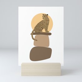 Leopard on the rocks Mini Art Print